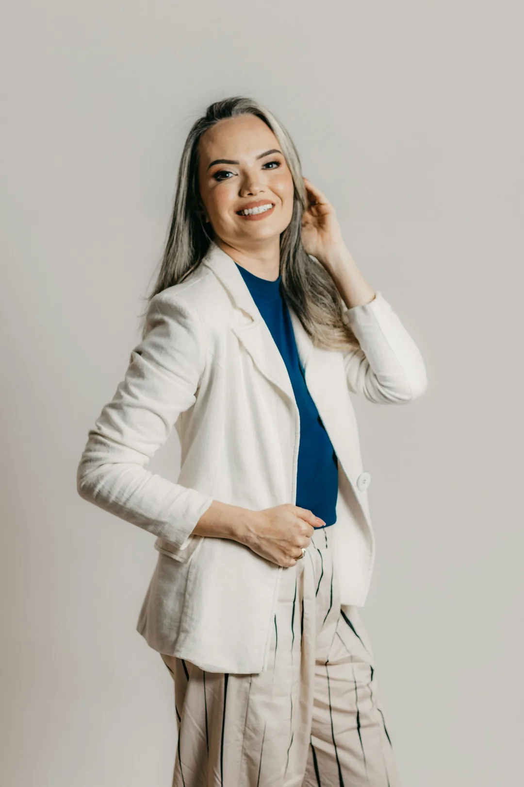 Woman standing confidently in soft light
